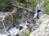La cascade de B�rard: Next we need to descend to reach the passarelle. The public walkway provides a great vantage point for passing hikers to watch the action on the via ferrata